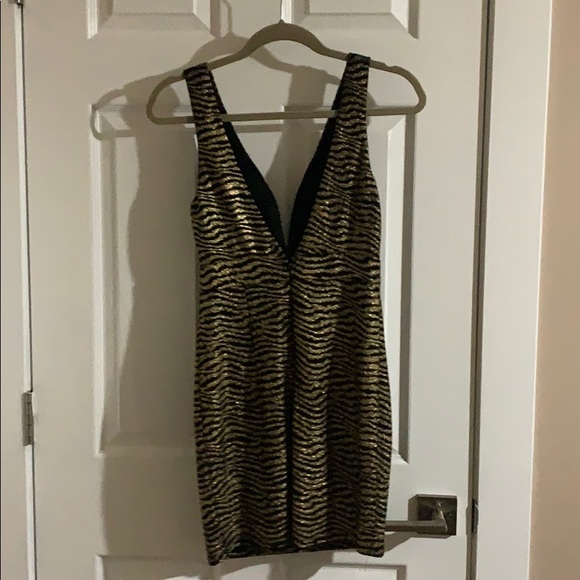 Gold and black mini dress. - Picture 2 of 3